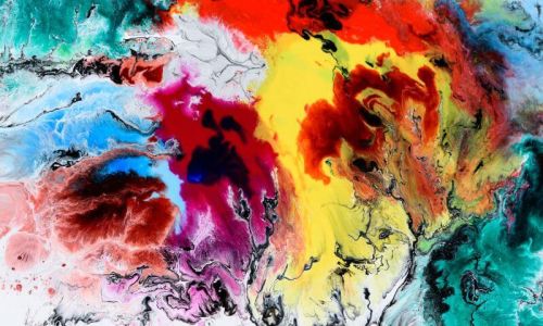 Un insieme di colori diversi mischiati a formare un quadro colorato a macchie